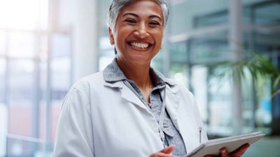 happy physician making direct eye contact